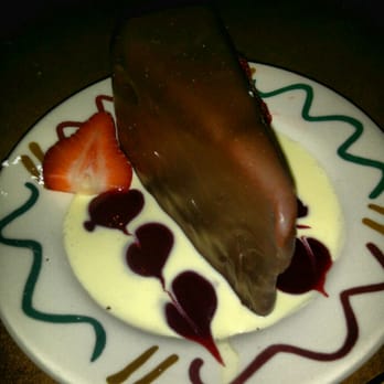 Giovanni's Restaurant - Flourless Chocolate Cake, covered in a chocolate shell... must try this! - Italian Near Me - Munster, Indiana