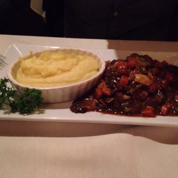 Garlic Rose Bistro - Braised short ribs with mashed potatoes - American Near Me - Cranford, New Jersey Garlic Rose Bistro - Braised short ribs with mashed potatoes - American Near Me - Cranford, New Jersey