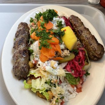 Momi's Kitchen - This was the Lamb Kabab with all of the fixings with the exception of a few. Delicious! - Mediterranean Near Me - Waldorf, Maryland Momi's Kitchen - This was the Lamb Kabab with all of the fixings with the exception of a few. Delicious! - Mediterranean Near Me - Waldorf, Maryland