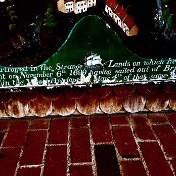 Gulliver's Restaurant - The inscription below the portrait of Gulliver out front. - American Near Me - Irvine, California