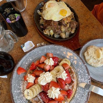 The Brunchery - Strawberry and banana Belgian waffle, and hash brown, biscuit with steak added to it - Breakfast & Brunch Near Me - Valrico, Florida The Brunchery - Strawberry and banana Belgian waffle, and hash brown, biscuit with steak added to it - Breakfast & Brunch Near Me - Valrico, Florida