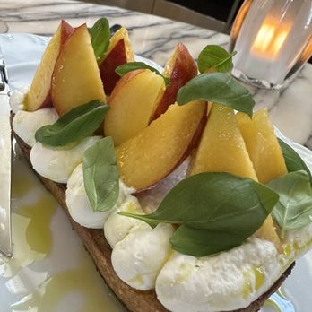 Funke - Are amazing appetizer. Fresh toast with whip, ricotta, olive oil, sea salt, basil, and the most amazing peaches I've ever had. - Italian Near Me - Beverly Hills, California