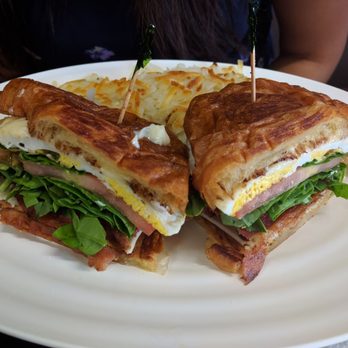 Sweet Desert Cafe - Croissant breakfast sandwich - bacon, egg, spinach, tomato, cheese, and mayo on a croissant, served with hash browns - Cafes Near Me - Tempe, Arizona Sweet Desert Cafe - Croissant breakfast sandwich - bacon, egg, spinach, tomato, cheese, and mayo on a croissant, served with hash browns - Cafes Near Me - Tempe, Arizona