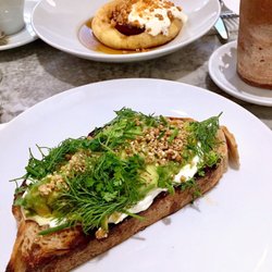Hām West Hampstead - Avocado on toast,hazelnut dukkah w/fresh cheese & herbs, Roast white peach pancake, creme fraiche, oat praline w/ maple syrup.