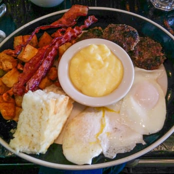 Jacob's Pickles - Coop Platter: 3fried eggs, nitrate-free bacon, house made breakfast sausage, grits, biscuit &home fries $15 - Comfort Food Near Me - New York, New York Jacob's Pickles - Coop Platter: 3fried eggs, nitrate-free bacon, house made breakfast sausage, grits, biscuit &home fries $15 - Comfort Food Near Me - New York, New York