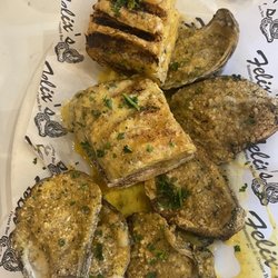 Sidewalk Food Tours of New Orleans - Char grilled oysters at Felix's