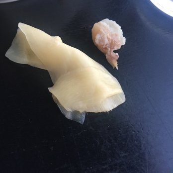Tsui Sushi Bar - A piece of unused fish found in my ginger slices all wrapped up. Disgusting. - Sushi Bars Near Me - Seattle, Washington Tsui Sushi Bar - A piece of unused fish found in my ginger slices all wrapped up. Disgusting. - Sushi Bars Near Me - Seattle, Washington