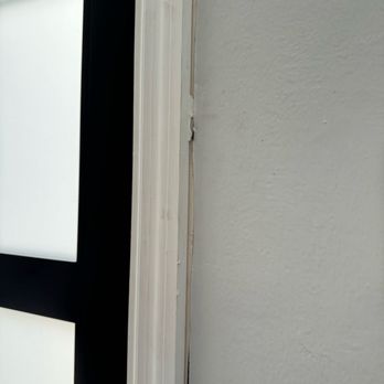 BnT Impact Windows and Doors - Unfinished molding and leaving our wall damaged - Windows Installation Near Me - POMPANO BEACH, Florida