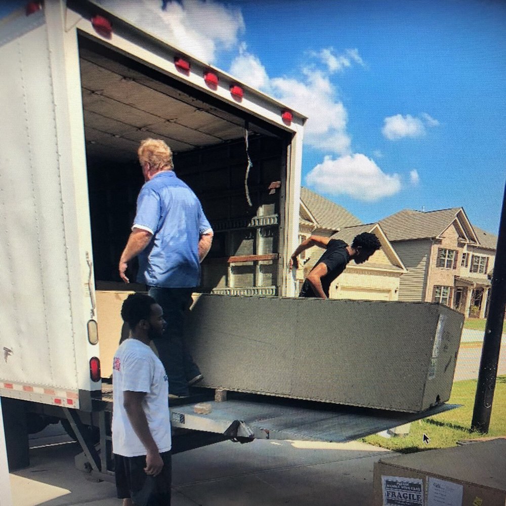 Calia / Maddalena - The one driver who came to deliver 6 crates to my driveway. The website claims the sofas would be delivered uncrated to my living room. - Cagliari, VS