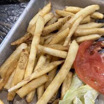 Rabel’s Roadhaus BBQ - Over cooked scraps of fries and missing burger. - Barbeque Near Me - La Vernia, Texas