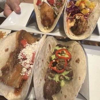 Flying Iguana - Steak taco and pork belly for me. My husband likes the blackened shrimp and fish tacos. - Latin American Near Me - Neptune Beach, Florida Flying Iguana - Steak taco and pork belly for me. My husband likes the blackened shrimp and fish tacos. - Latin American Near Me - Neptune Beach, Florida