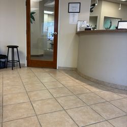 Aten Dental Group - Front desk and door to treatment area.
