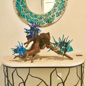 Outer Banks Driftwood - a table with a mirror and a sculpture - Home Decor Near Me - Kill Devil Hills, North Carolina