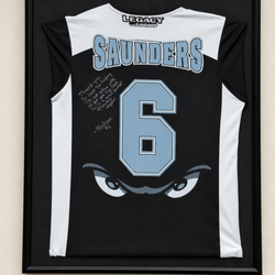 Advanced Sports Chiropractic - "Signed jersey from a local softball player displayed at Advanced Sports Chiropractic.