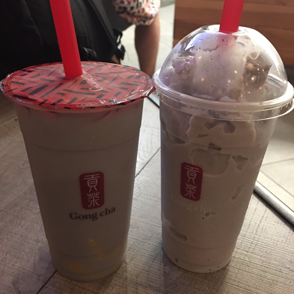 Gong Cha - Left: large taro iced milk tea with light ice and pudding Right: large taro smoothie - Bubble Tea Near Me - Rockville, Maryland