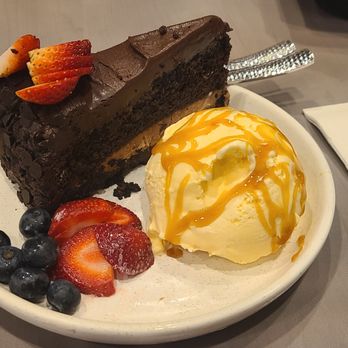 Paloma's at Lela - Chocolate layer cake with ice cream - Diners Near Me - Wilmington, North Carolina Paloma's at Lela - Chocolate layer cake with ice cream - Diners Near Me - Wilmington, North Carolina