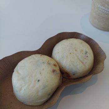 Starbucks - two buns in a paper plate on a table - Coffee & Tea Near Me - Orlando, Florida Starbucks - two buns in a paper plate on a table - Coffee & Tea Near Me - Orlando, Florida