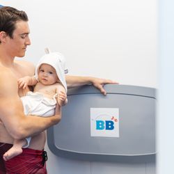 Big Blue Swim School - Changing tables offered in every changing room