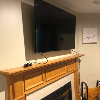 First Tech Solutions - Mounted a 50in tv above the fireplace. - TV Mounting Near Me