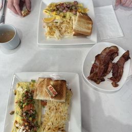 Veggie omelette, sausage omelette and a side of bacon