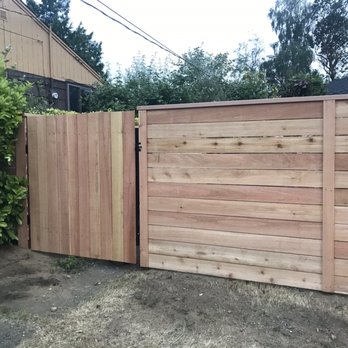 Knocking Wood - Cedar fence straight across the front yard. Dog proof entrance with double gates. - Fences & Gates Near Me