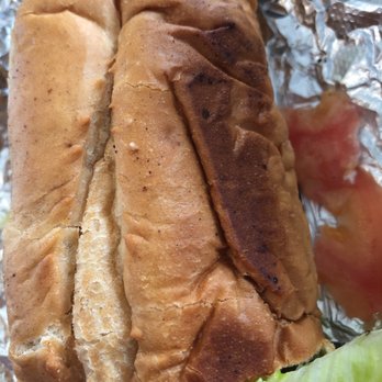 Mo' Burgerz - hot dog with lettuce and tomato - Food Trucks Near Me Mo' Burgerz - hot dog with lettuce and tomato - Food Trucks Near Me