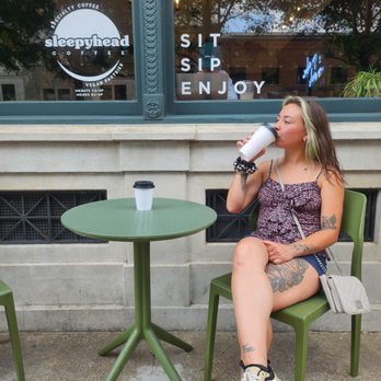 Sleepyhead Coffee - Savanna enjoying a dirty chai latte just outside this wonderful cafe. - Coffee & Tea Near Me - Chattanooga, Tennessee Sleepyhead Coffee - Savanna enjoying a dirty chai latte just outside this wonderful cafe. - Coffee & Tea Near Me - Chattanooga, Tennessee