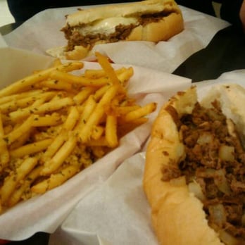 Philly Ya Belly - garlic fries and mushroom and onion steak - Sandwiches Near Me - Everett, Washington Philly Ya Belly - garlic fries and mushroom and onion steak - Sandwiches Near Me - Everett, Washington