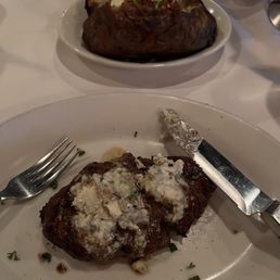 Filet Mignon and a huge Loaded Baked Potato. Filet Mignon and a huge Loaded Baked Potato.