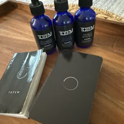 My well worn Totem tarot deck and 3 of my most used Totem flower essences
