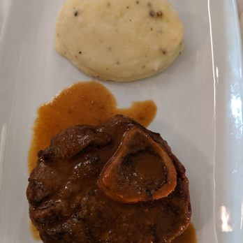 Antica Osteria Cavallini - Veal ossobuco (sliced veal shank) with mushed potatoes and black truffle - Italian Near Me - Milan, Michigan
