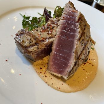 Cochon RESTAURANT - Grilled yellowfin tuna with blistered shishitos and eggplant, smoked tomato dressing. - Cajun/Creole Near Me - New Orleans, Louisiana Cochon RESTAURANT - Grilled yellowfin tuna with blistered shishitos and eggplant, smoked tomato dressing. - Cajun/Creole Near Me - New Orleans, Louisiana