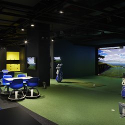 The Bridge Golf Learning Center - Interior of The Bridge Golf Learning Center, showing TrackMan simulator.