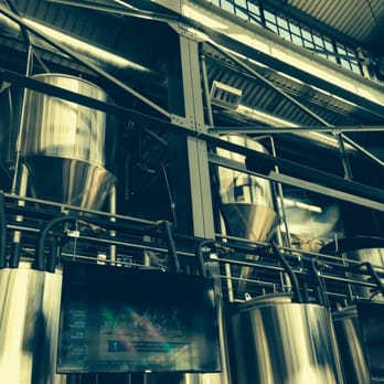Bluejacket - The wall of stainless steel brewing kettles, viewed from the bar area. - Breweries Near Me - Washington, DC, District of Columbia Bluejacket - The wall of stainless steel brewing kettles, viewed from the bar area. - Breweries Near Me - Washington, DC, District of Columbia
