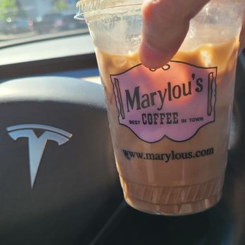 Marylou's Coffee - a hand holding a cup of coffee - Coffee & Tea Near Me - Plymouth, Massachusetts Marylou's Coffee - a hand holding a cup of coffee - Coffee & Tea Near Me - Plymouth, Massachusetts