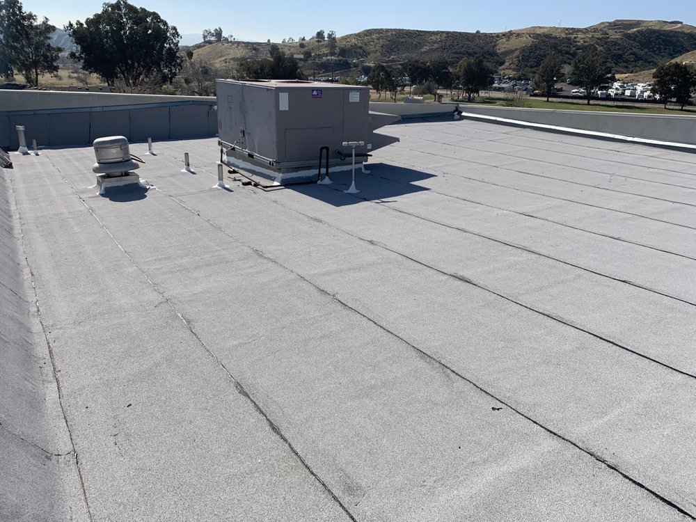Slide of Espinal's Roofing & Waterproofing