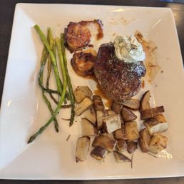 Sirloin steak with an add on scallops. Sirloin steak with an add on scallops.