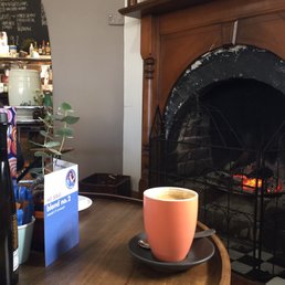Lovely coffee in front of open fire