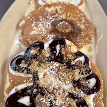 Snooze, an A.M. Eatery - Pancake flight white chocolate macadamia nut, banana nut, and blueberry danish - Breakfast & Brunch Near Me - Houston, Texas Snooze, an A.M. Eatery - Pancake flight white chocolate macadamia nut, banana nut, and blueberry danish - Breakfast & Brunch Near Me - Houston, Texas