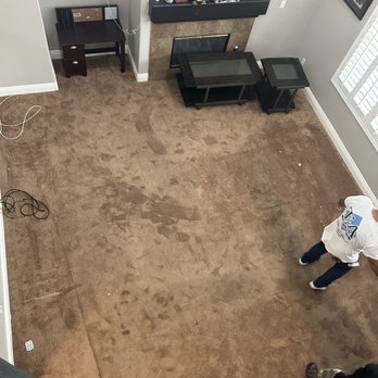 T & A Flooring - two people in a living room - Flooring Near Me