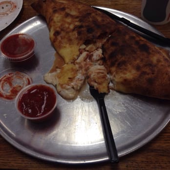 The Big Slice - Calzone with two toppings - Pizza Near Me - Springfield, Missouri The Big Slice - Calzone with two toppings - Pizza Near Me - Springfield, Missouri