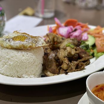 What The Pho - a plate of rice, meat, and vegetables - Vietnamese Near Me - Plano, Texas What The Pho - a plate of rice, meat, and vegetables - Vietnamese Near Me - Plano, Texas