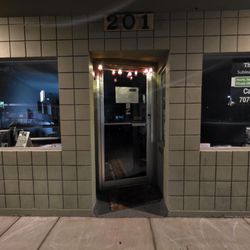 Teisha M. Mechetti - Nighttime Rogue River Storefront