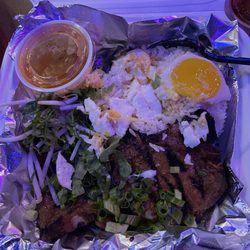 Great American Casino - Grilled Porkchops, rice, Egg and a little salad.