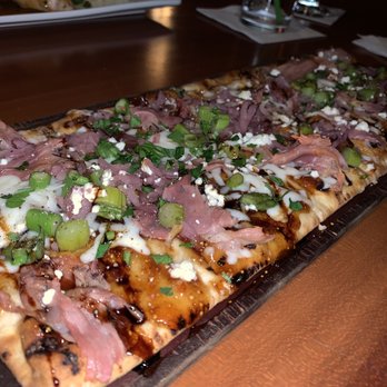 Redstone American Grill - Fig and Prosciutto flatbread - Steakhouses Near Me - Bridgewater, New Jersey Redstone American Grill - Fig and Prosciutto flatbread - Steakhouses Near Me - Bridgewater, New Jersey