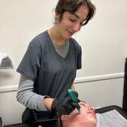 Bruce Pendleberry, OMD, LAC - Dr. M treating a patient with Facial Microneedling.