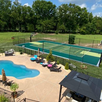 Happy Backyards - Aerial view of a luxury backyard with pool and multi-sport court. - Kids Activities Near Me - Collierville, Tennessee Happy Backyards - Aerial view of a luxury backyard with pool and multi-sport court. - Kids Activities Near Me - Collierville, Tennessee