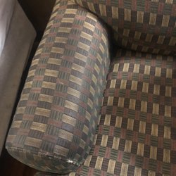 Auburn Place Hotel & Suites - Dirty sofa chair