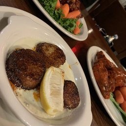 Black and Blue Scallops (front), Classic BBQ wings (back left), and Classic Buffalo Wings (back right)