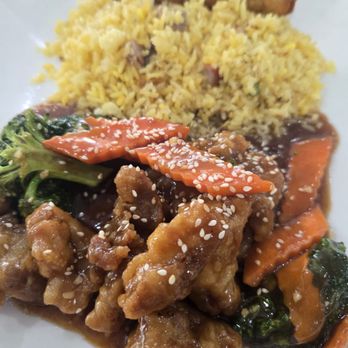 Tao Ngo Restaurant - Sesame chicken with fried rice and an egg roll - Vietnamese Near Me - Houston, Texas